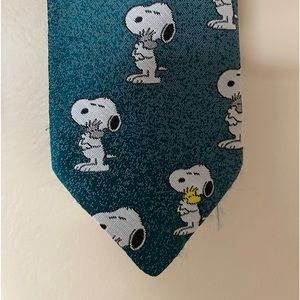 Cervantes necktie; Snoopy and Woodstock. Poly/silk blend.